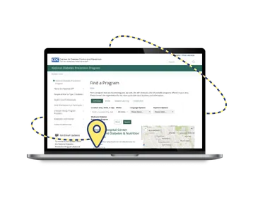 Laptop with the CDC Diabetes Prevention Program website page and a symbol of a location marker