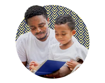 Man and child reading together